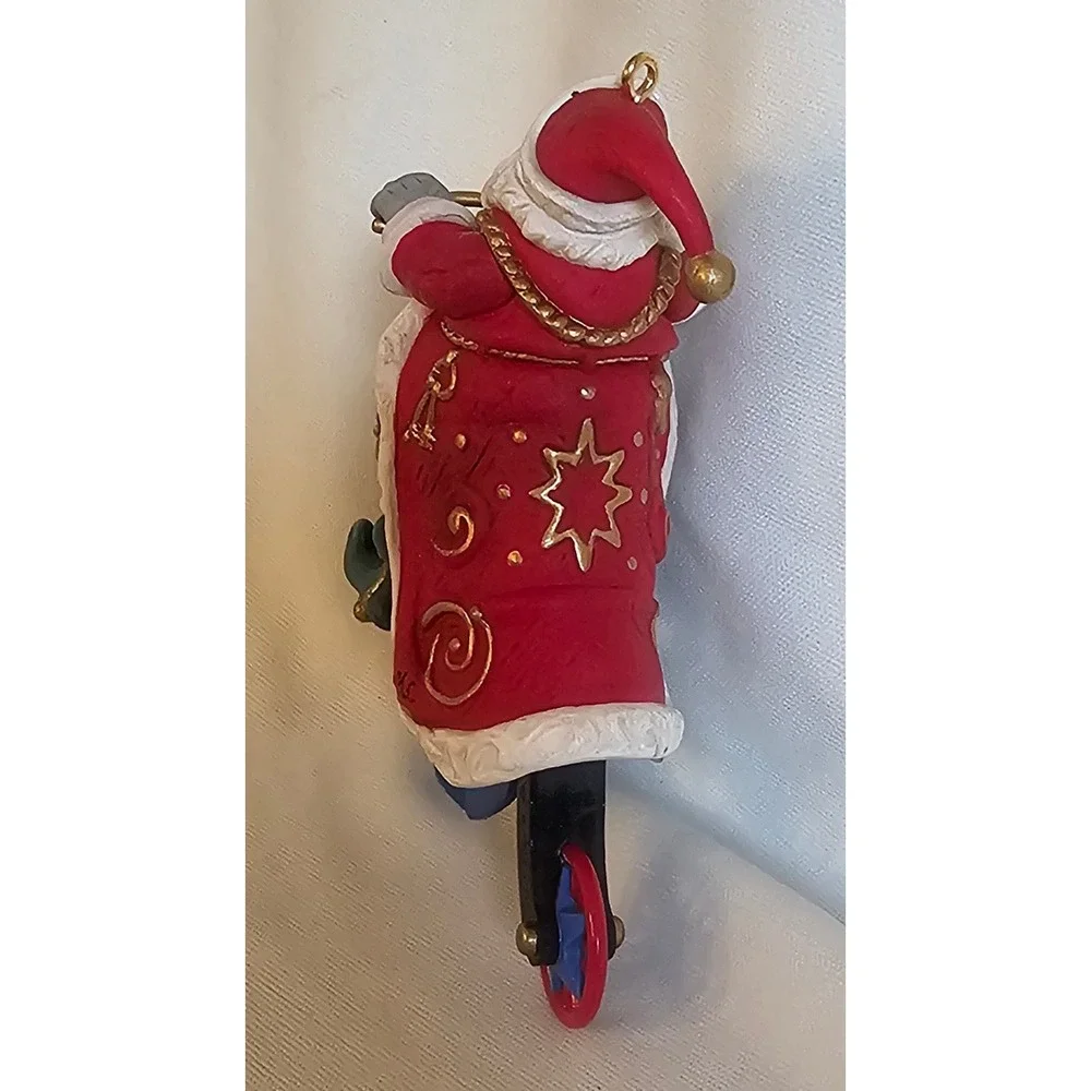Vintage 1999 Santa Claus on Bicycle Christmas Ornament Red Blue 4.25